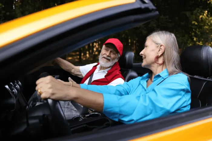 older couple that represents snowbirds visiting florida for the season in need of an affordable used car in sarasota