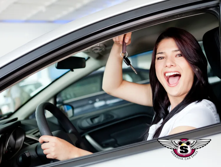 happy female driver at sarasota car sales